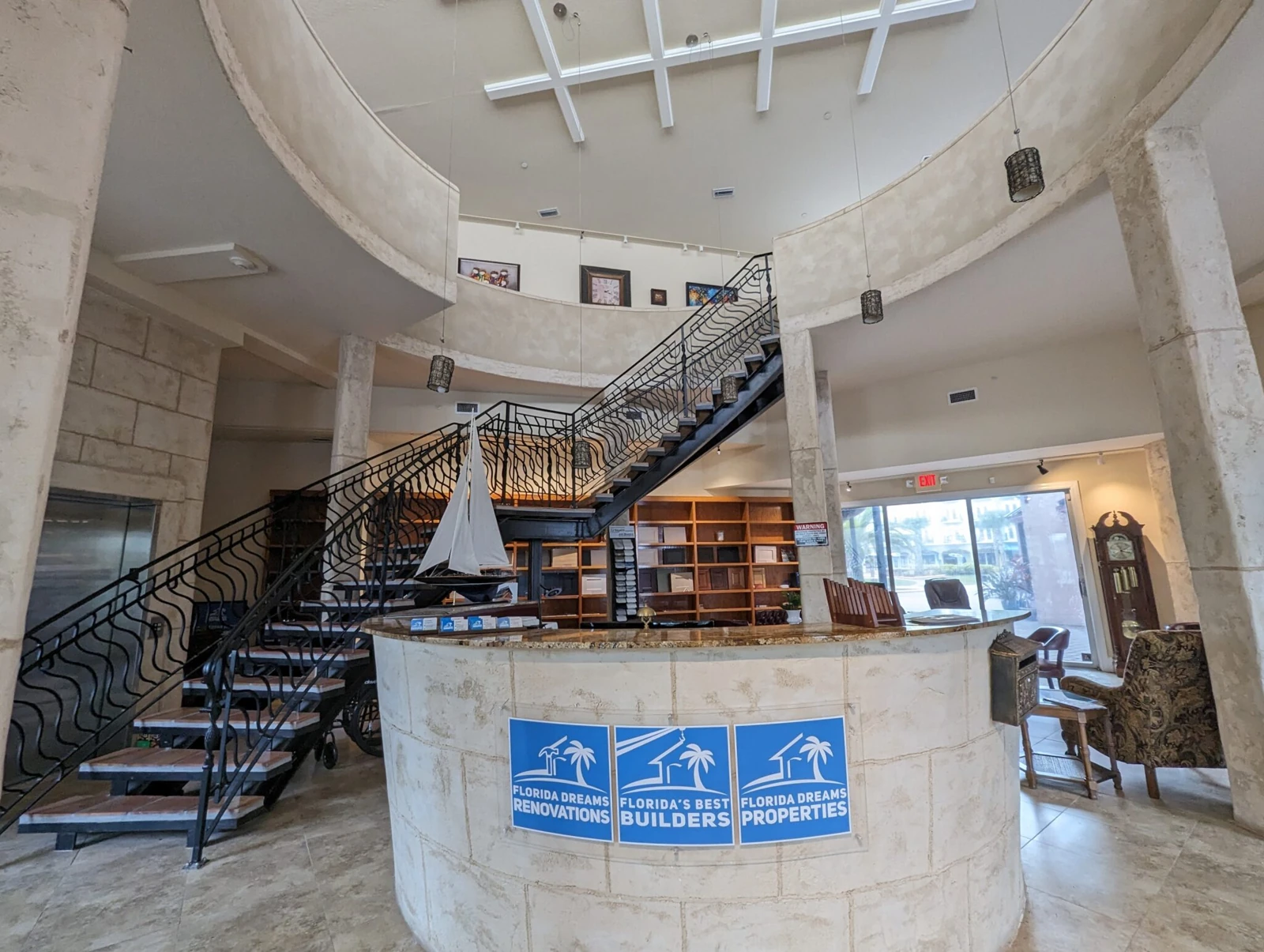 FBB office reception in European Village, Palm Coast, with the Florida’s Best Builders sign on the front desk